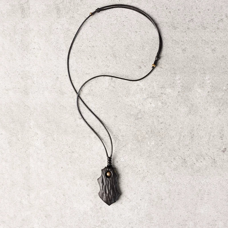 Vintage Handcrafted Brass-Inlaid Ebony Pendant