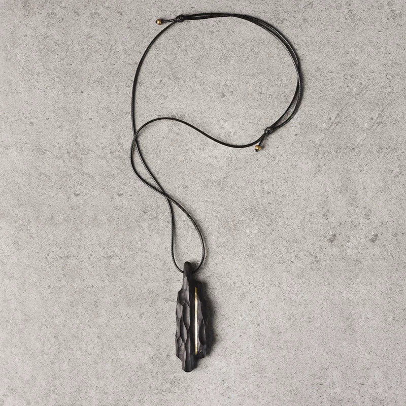 Vintage Handcrafted Brass-Inlaid Ebony Pendant