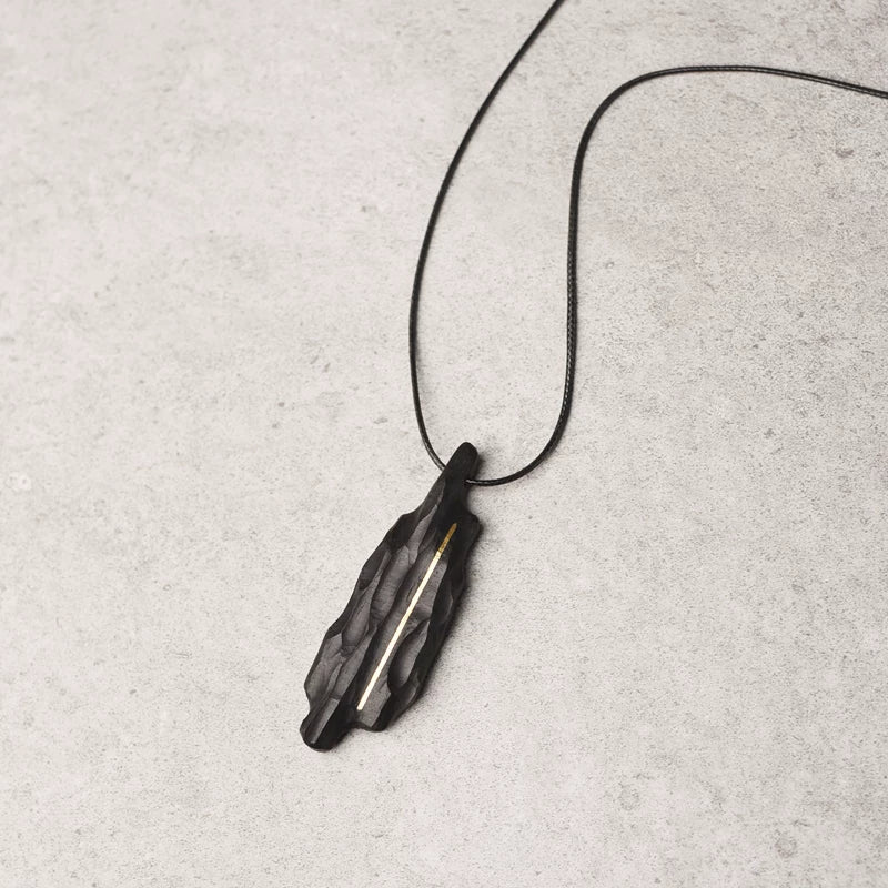 Vintage Handcrafted Brass-Inlaid Ebony Pendant