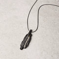 Vintage Handcrafted Brass-Inlaid Ebony Pendant